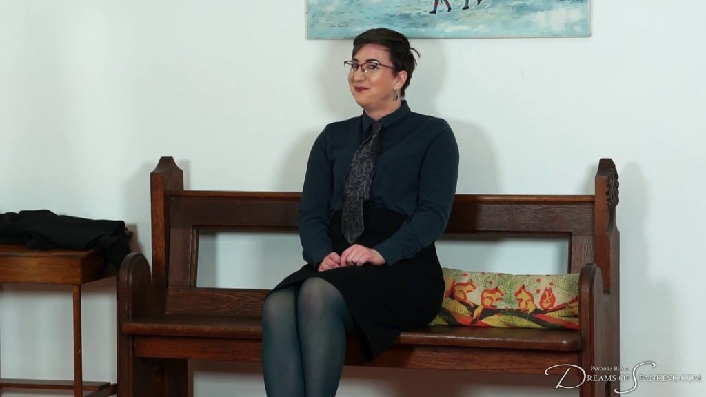 Blake waits on the bench after spanking themselves