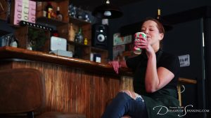 Alora drinks a coffee and looks satisfied