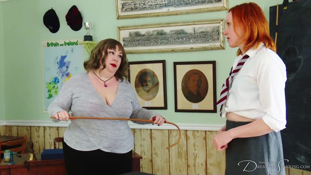 Nimue confronts her student holding a cane