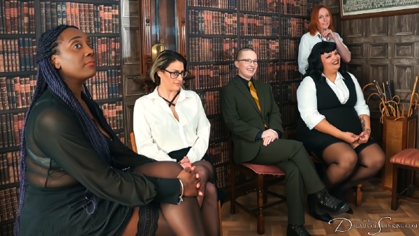Image showing five racially and gender diverse performers in business suits in a book-lined study