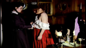 The servant is dragged away by the housekeeper for her punishment
