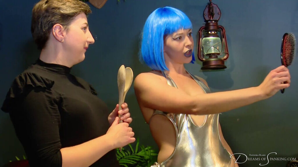 Alora inspects the new implement she holds in her hand