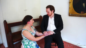 Pandora kneels before her husband James after her spanking