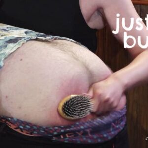 Chris receives an OTK spanking with a hairbrush on his bare bottom