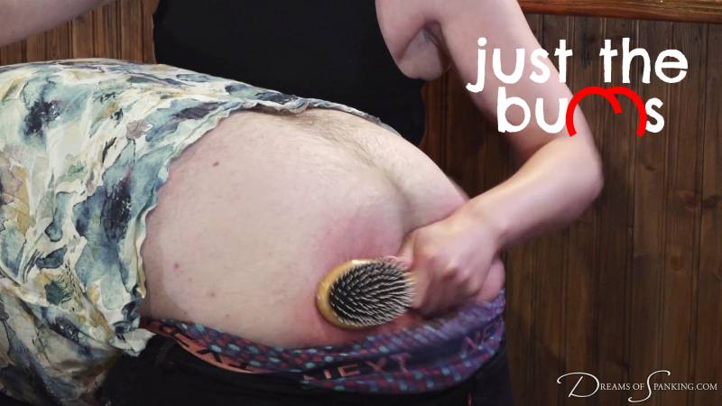 Chris receives an OTK spanking with a hairbrush on his bare bottom