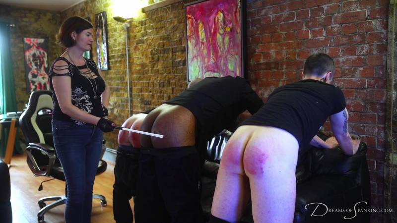 The gang boss gives a bare bottom punishment with a synthetic birch to the three bent over gang members, who definitely aren't crying